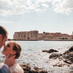 Couple having a wedding in front of Dubrovnik Fortress